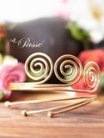 Esclava o Brazalete dorada Tres espirales