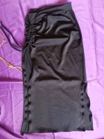 Falda negra con recogido